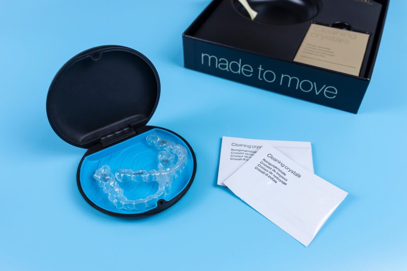 Invisalign aligners and cleaning crystals